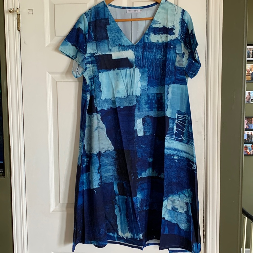 NWOT. Multi blue coloured dress